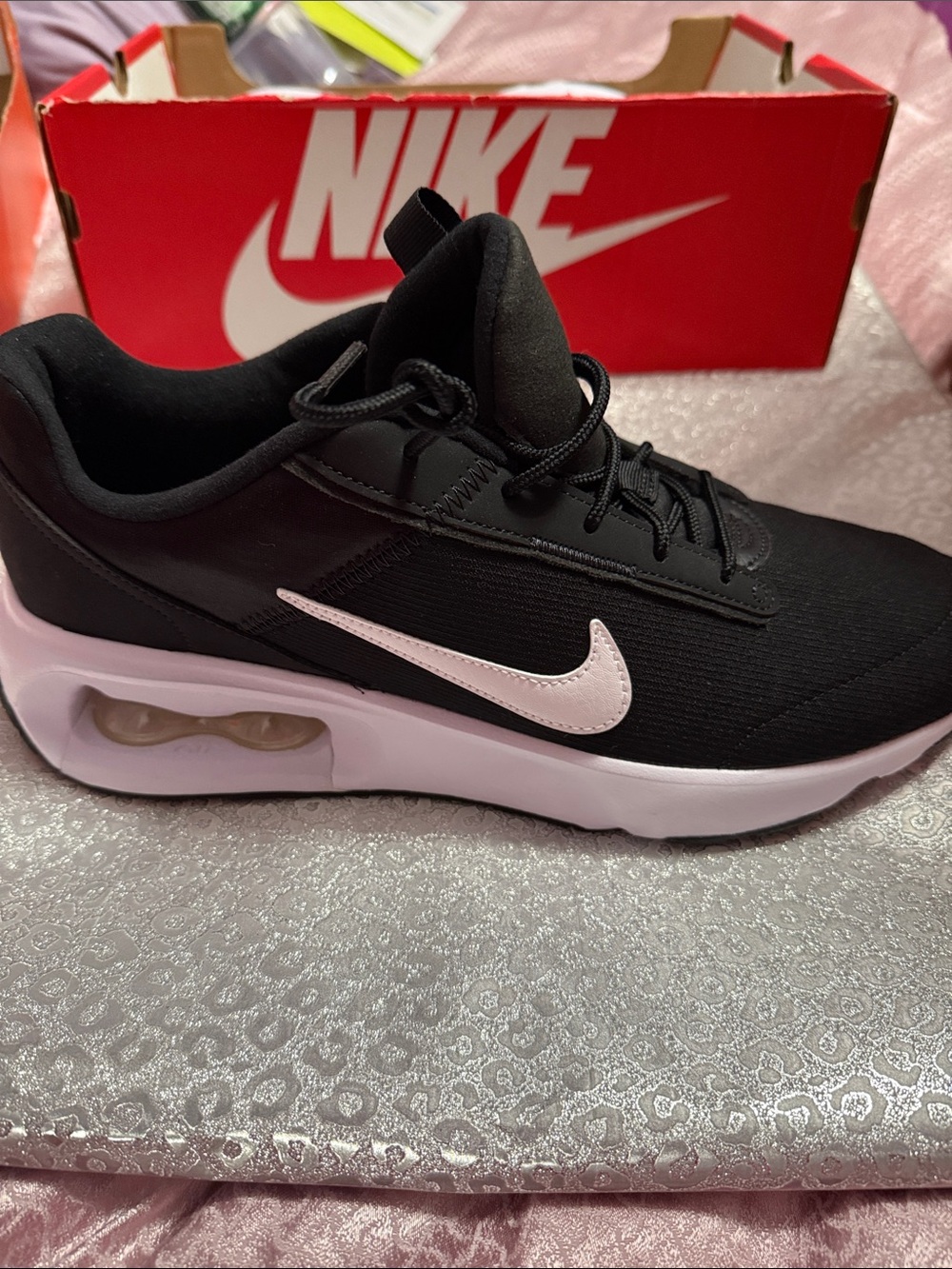 Nike Women’s Black Sneakers with white Swoosh